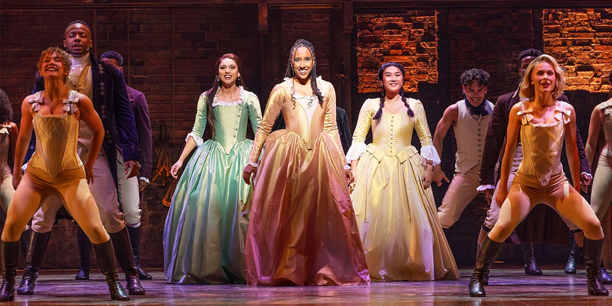 Bente Mulan, Eliza, Emily Mae, Angelica, Jasmine Jia-Yung Shen, and Peggy pose together in costumes.