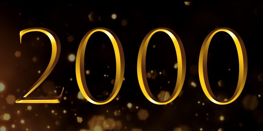 Gold rings with a shimmering background, representing the Olivier Awards 2000, against a dark backdrop.