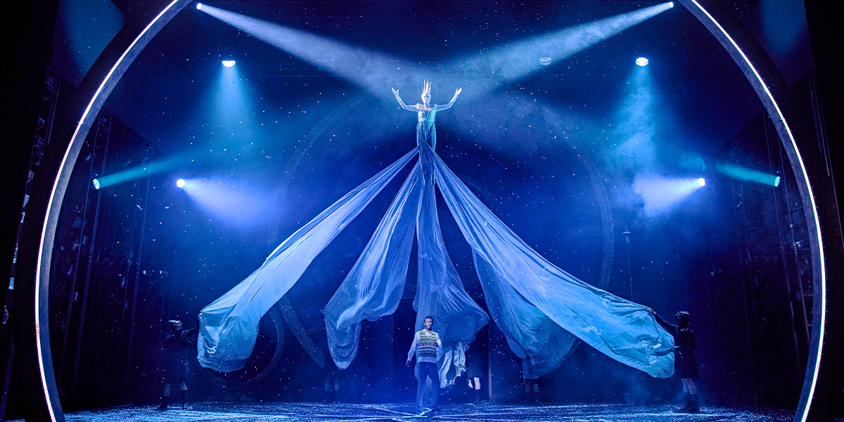 The White Queen is risen in the air. Edmund stands below.