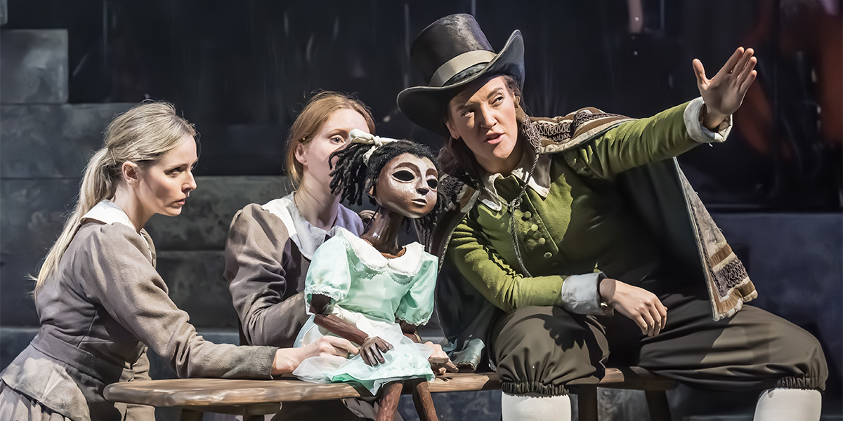 Diana Vickers, Rosalind Ford, and Lauryn Redding perform together on stage in Coven at Kiln Theatre.