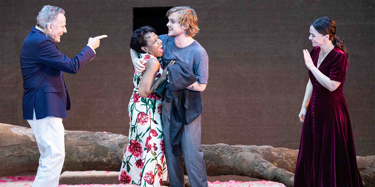 Bryan Cranston, Marianne Jean-Baptiste, Tom Glynn-Carney, and Hayley Squires pose together in a dramatic scene.