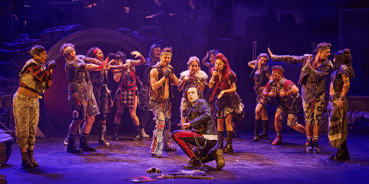 Glenn Adamson centre as Strat the cast in BAT OUT OF HELL credit Chris Davis Studio 1200x600 1 1