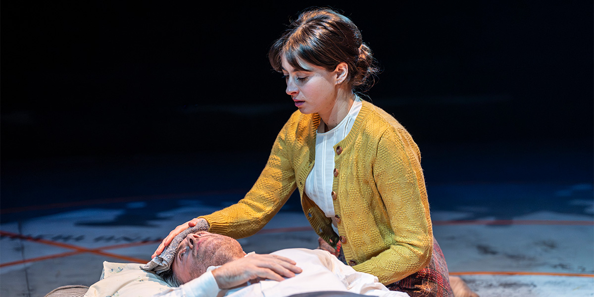 Agnes O'Casey and Rory Keenan perform on stage in a dramatic scene from The Spy Who Came In From The Cold.