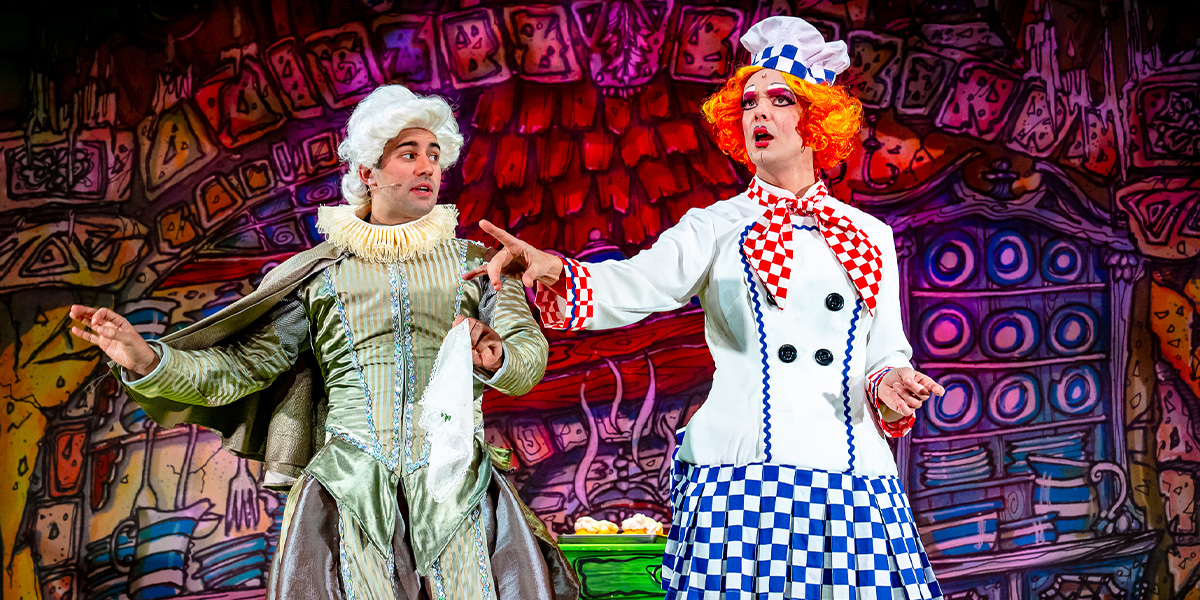 Ben Mabberey and Matthew Baldwin perform in a scene from Beauty and the Beast, wearing elaborate costumes.