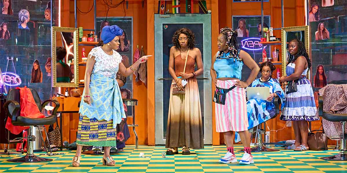 Dolapo Oni, Dani Moseley, Bola Akeju, Karene Peter, and Jadesola Odunjo pose together at Jaja's African Hair Braiding.