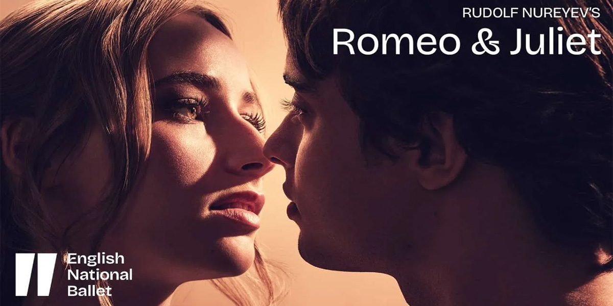 A dramatic scene from Romeo and Juliet, featuring two actors in period costumes, surrounded by a dark, moody backdrop.