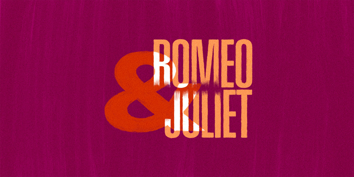 A dramatic scene from Romeo and Juliet, featuring two actors in period costumes, embracing on stage.